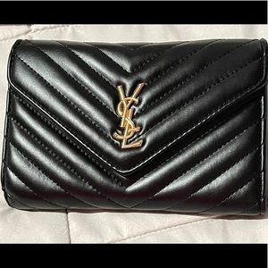 YSL cross body bag in black and gold